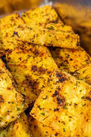 close up of herbed air fried tofu chunks.