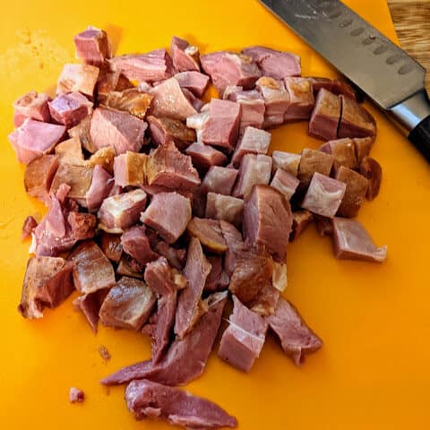 chopped smoked turkey on a cutting board.