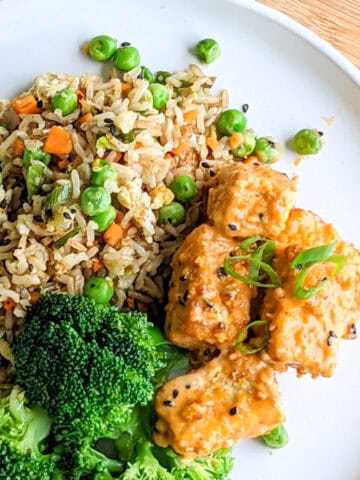 bang bang tofu with fried rice and steamed broccoli