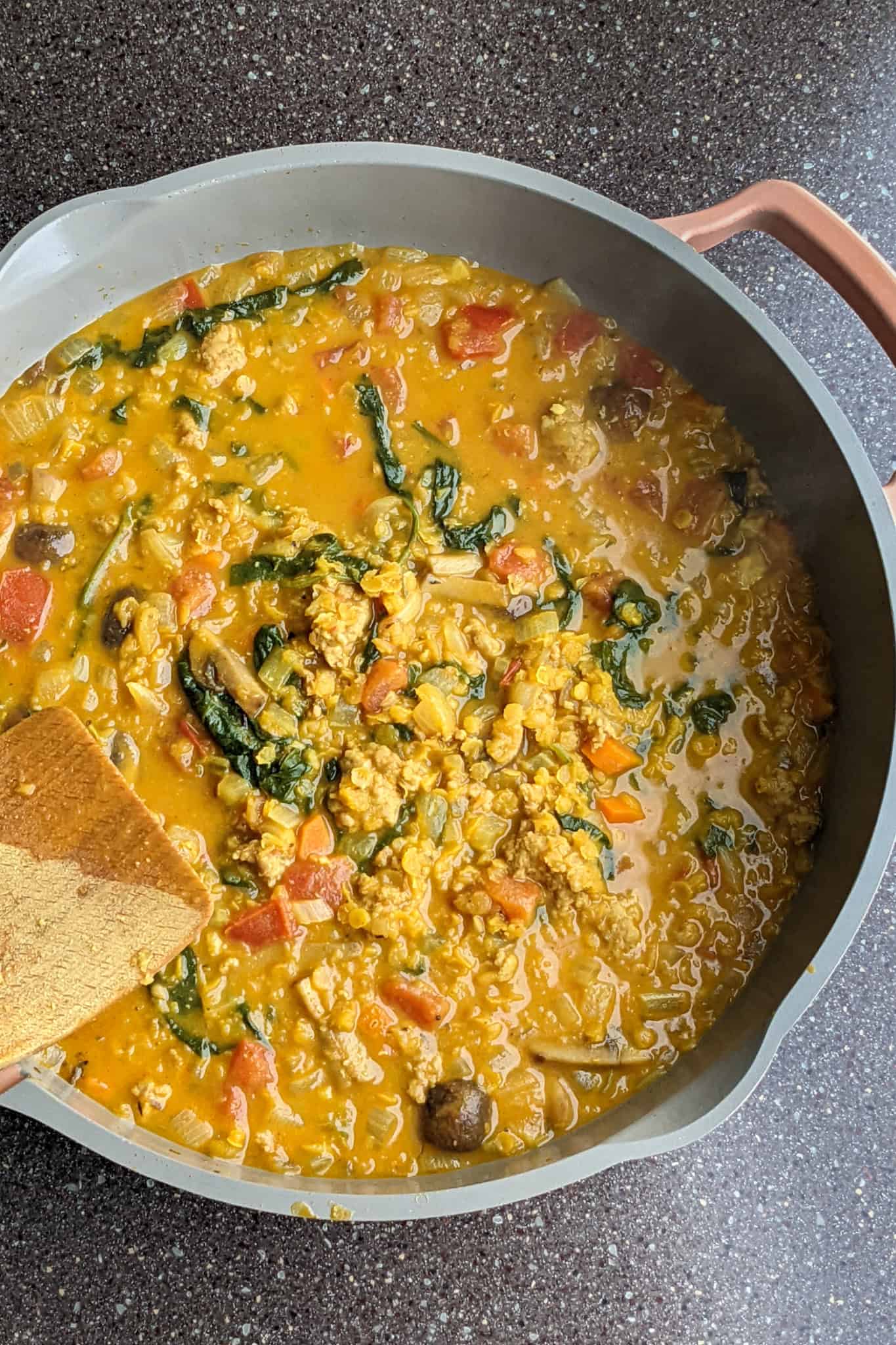 Curry lentil turkey stew in a large skillet