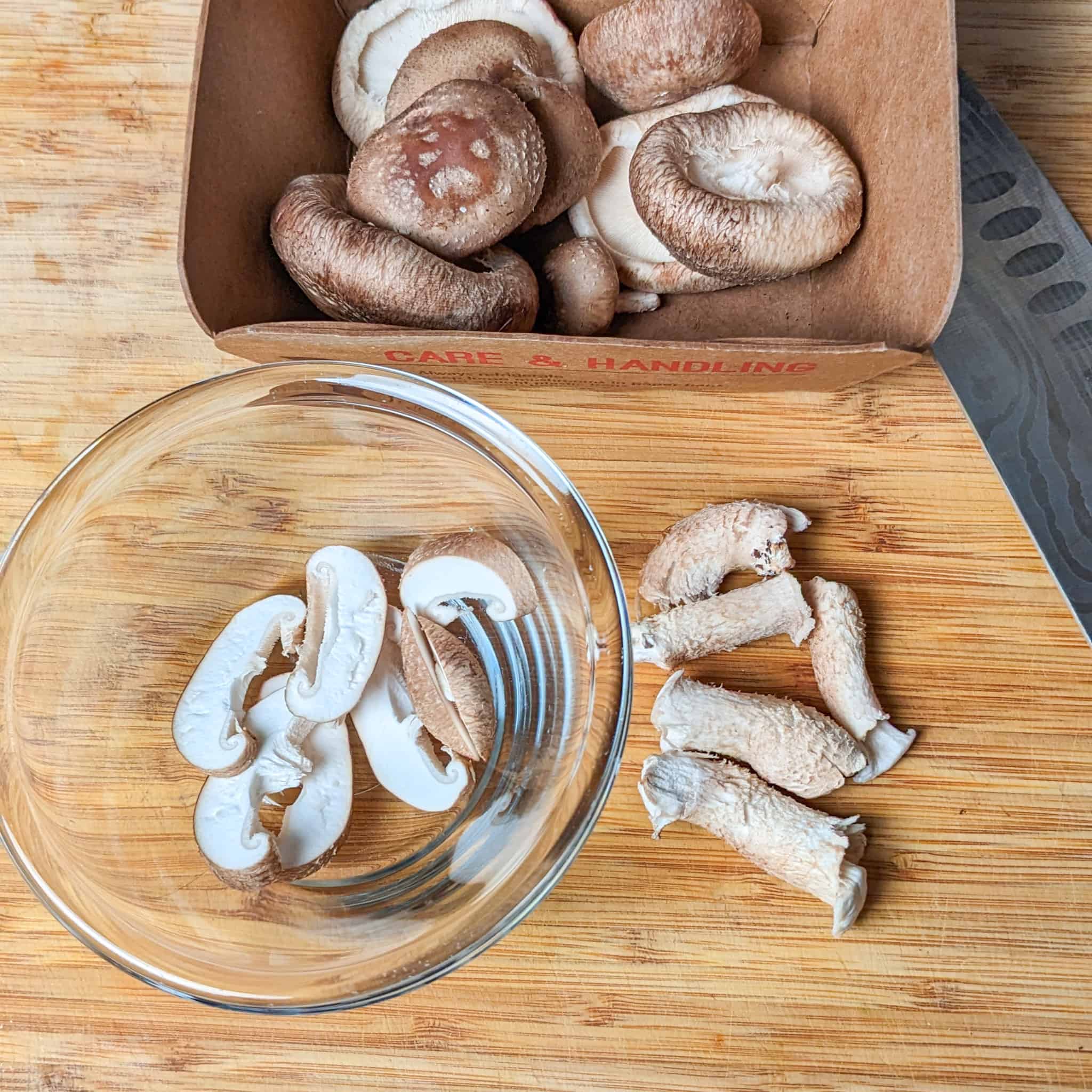 fresh shiitake mushrooms with stems removed.