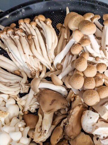 mixed mushrooms on a round tray