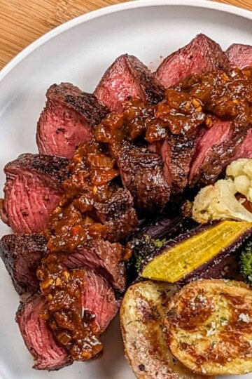 top view of the Pan-Seared Sirloin Steak with Spicy Baharat Sauce dish