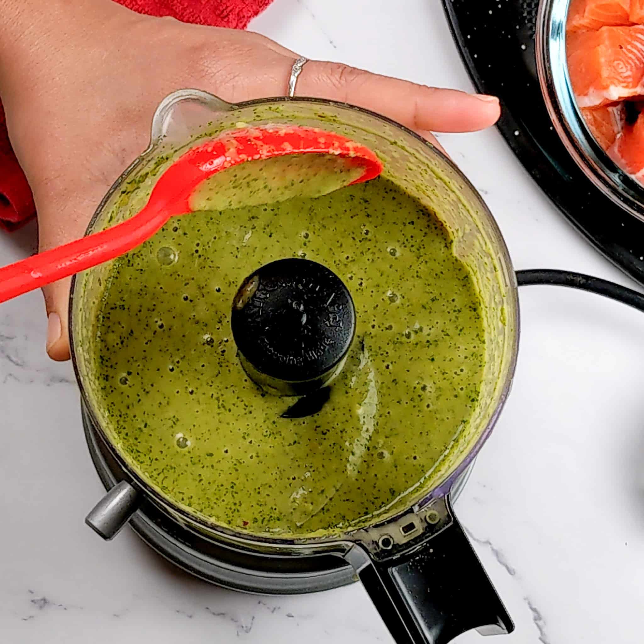 Spicy cilantro Lime Dressing in a food process for the Air Fryer Spicy Cilantro Lime Salmon Salad Rice Bowl recipe