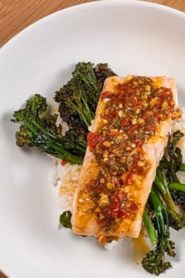 top view of the Calabrian Pepper Basil Baked Salmon and Broccolini in a wide round pasta bowl