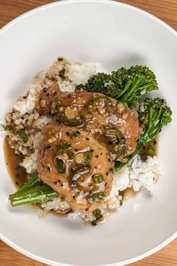 top view of the Spicy Honey Jalapeno Lime Chicken with Broccolini om a wide round bowl.