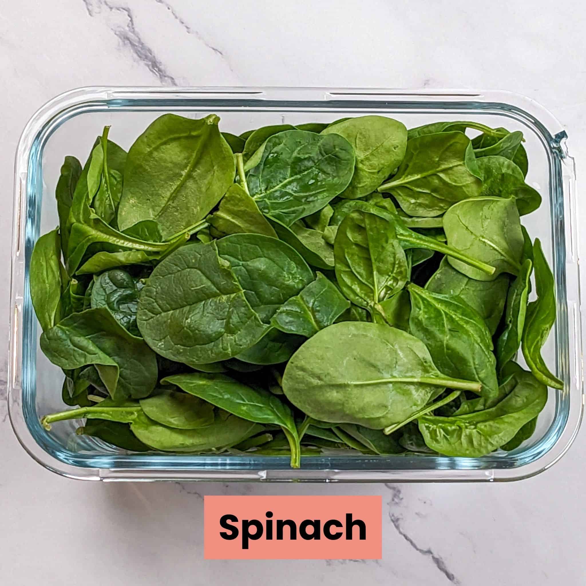 baby spinach in a glass rectangle container