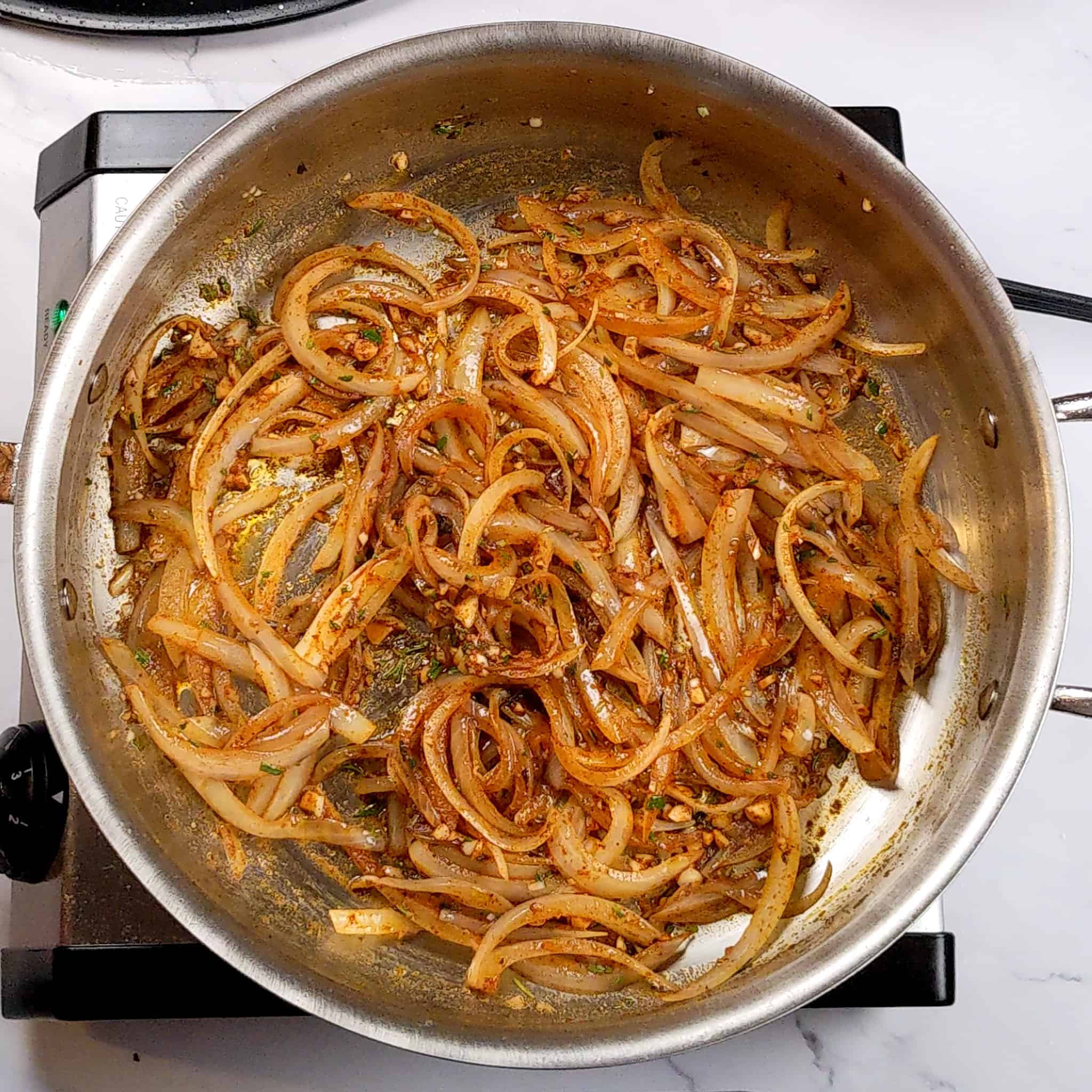 brown sauted thinly sliced onions in an all-clad saute pan