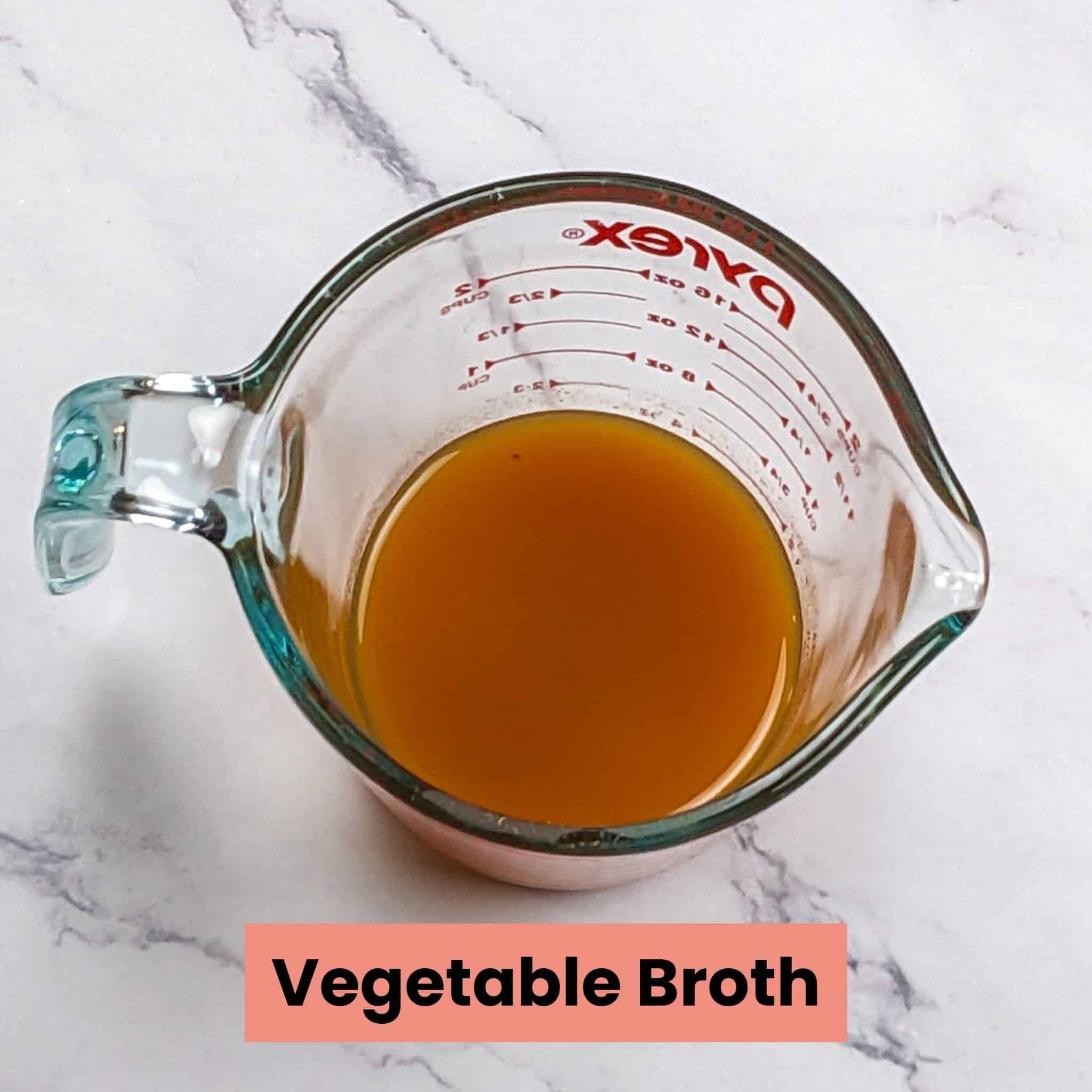 pyrex measuring cup with vegetable broth