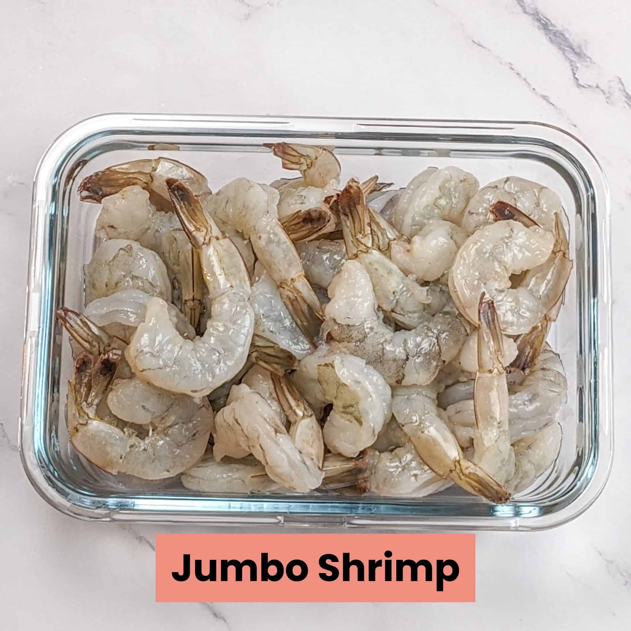 jumbo deveined and shelled shrimp in a glass rectangle container.