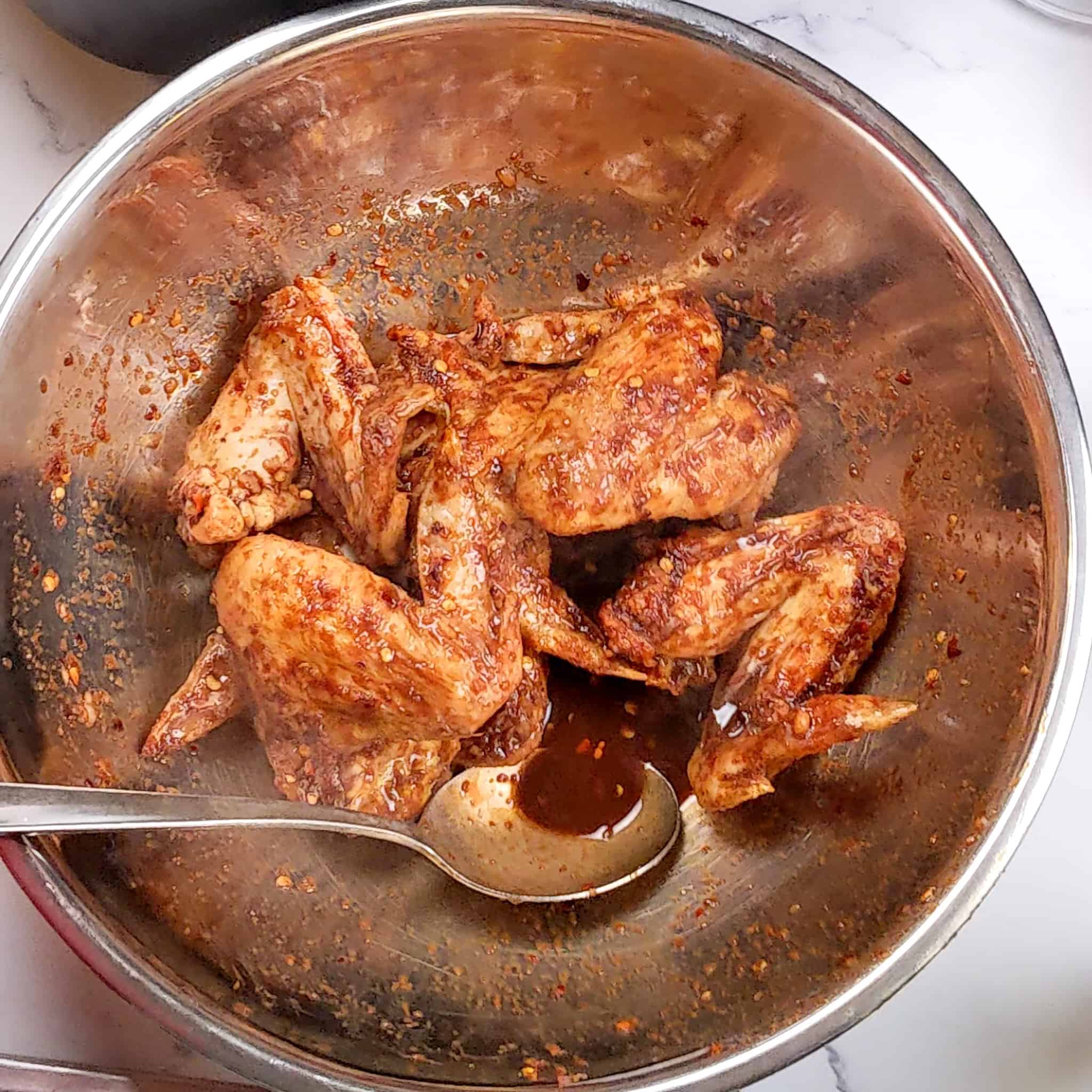 cooked whole chicken wings based with the sticky date teriyaki sauce