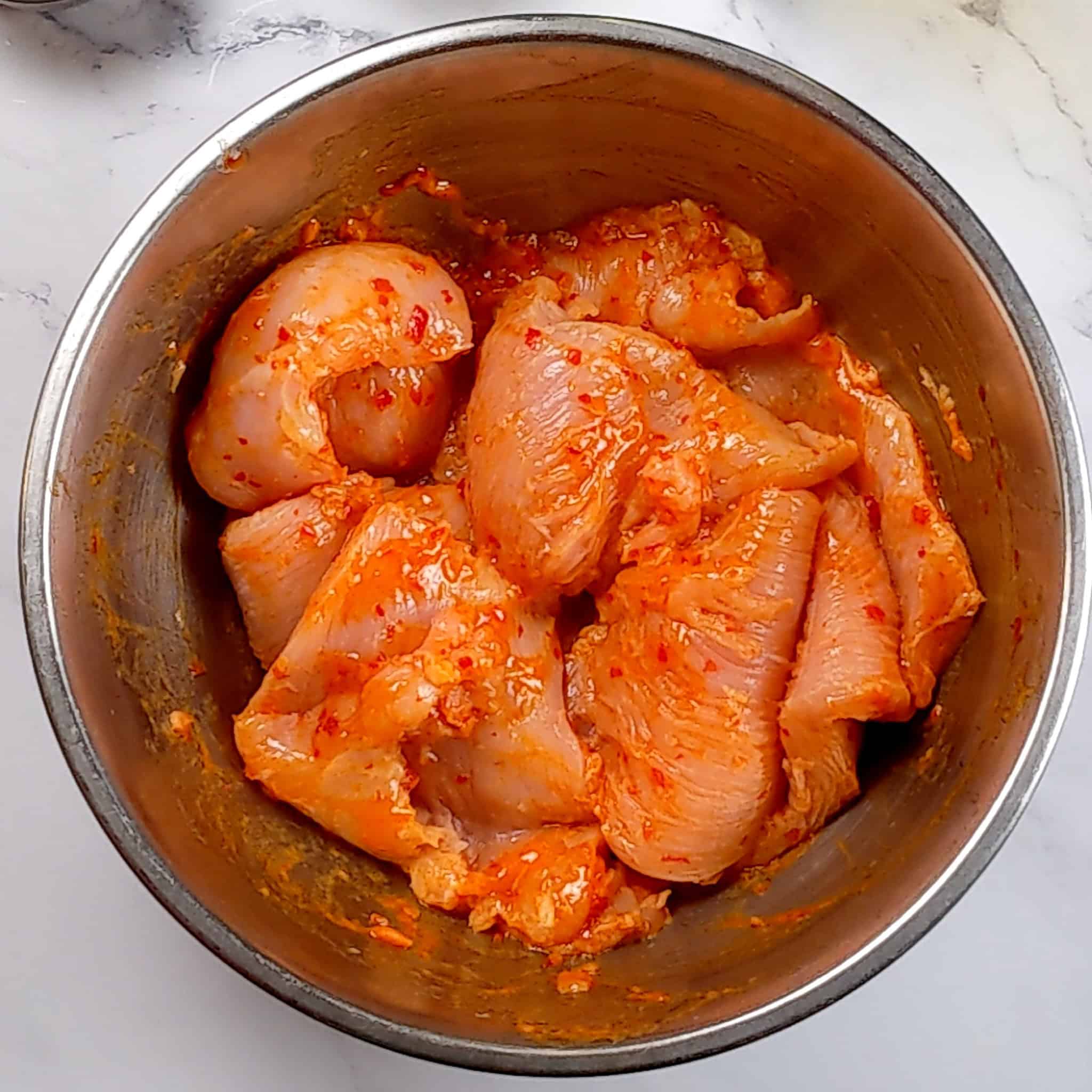 thick chicken cutlets marinated in a garlic chili sauce seasoning.