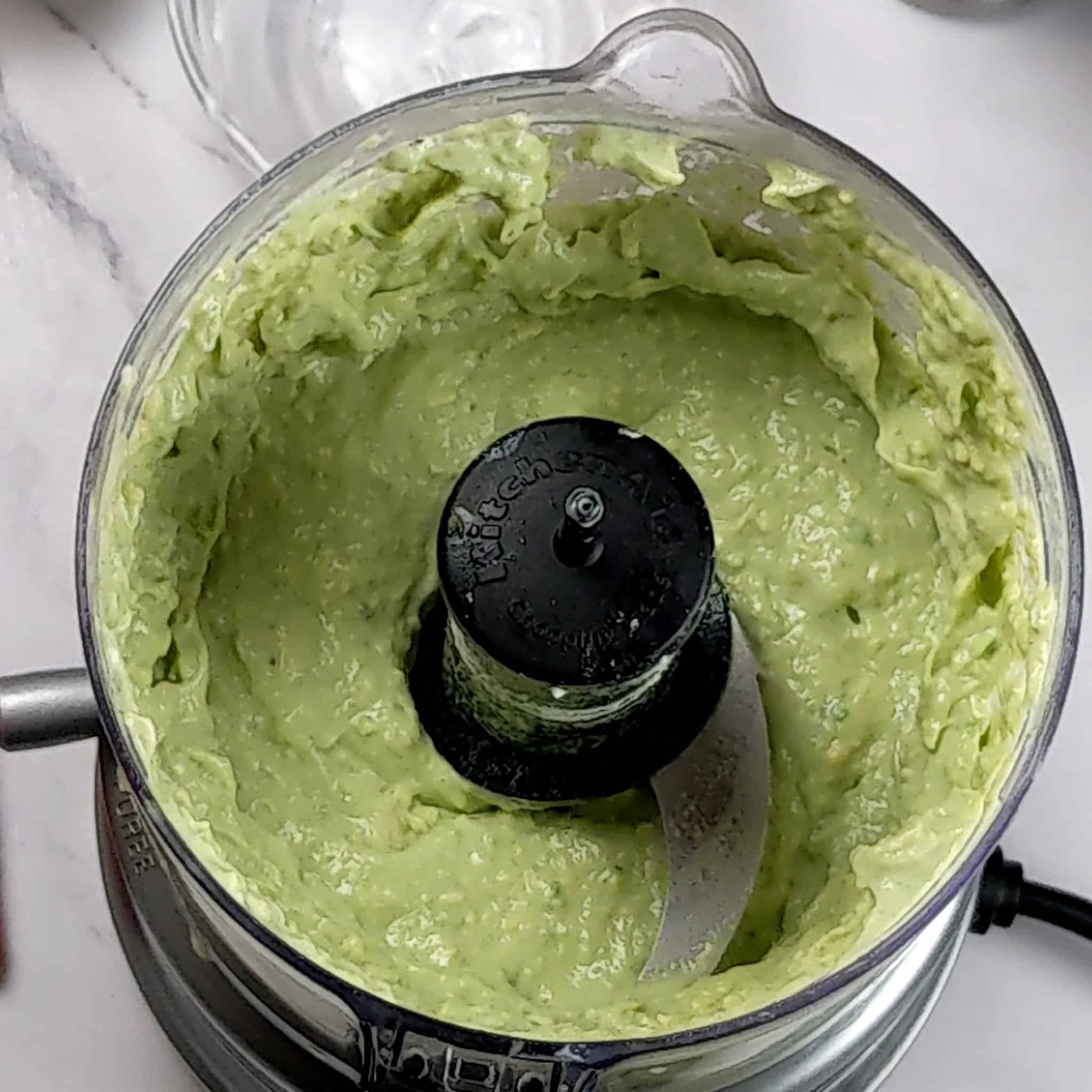blended avocado cream in a kitchenaid food processor.