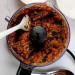 kitchenaid food processor with blended red bell pepper aromatic paste aka ata gige.