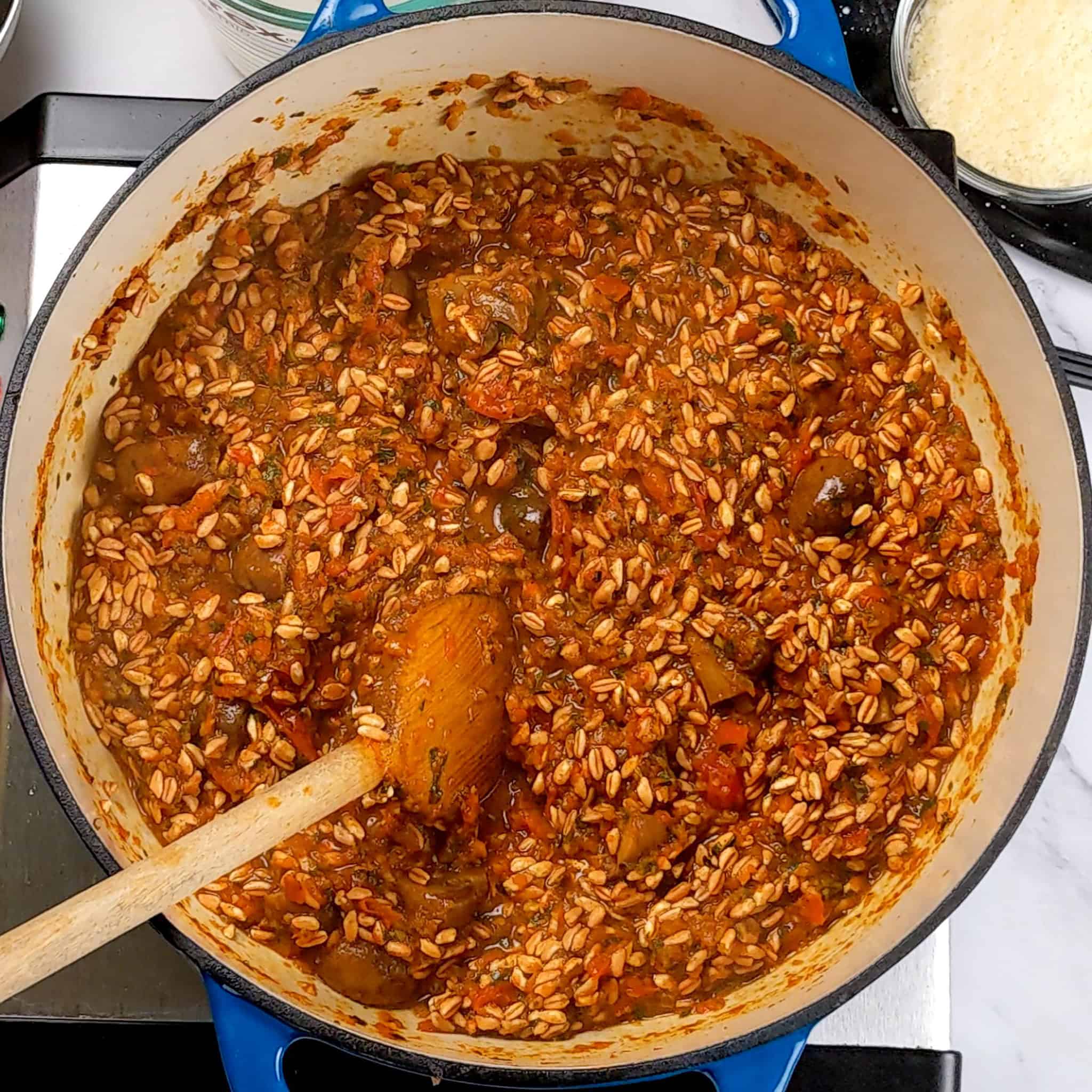 tomato red bell pepper base with farro grains.