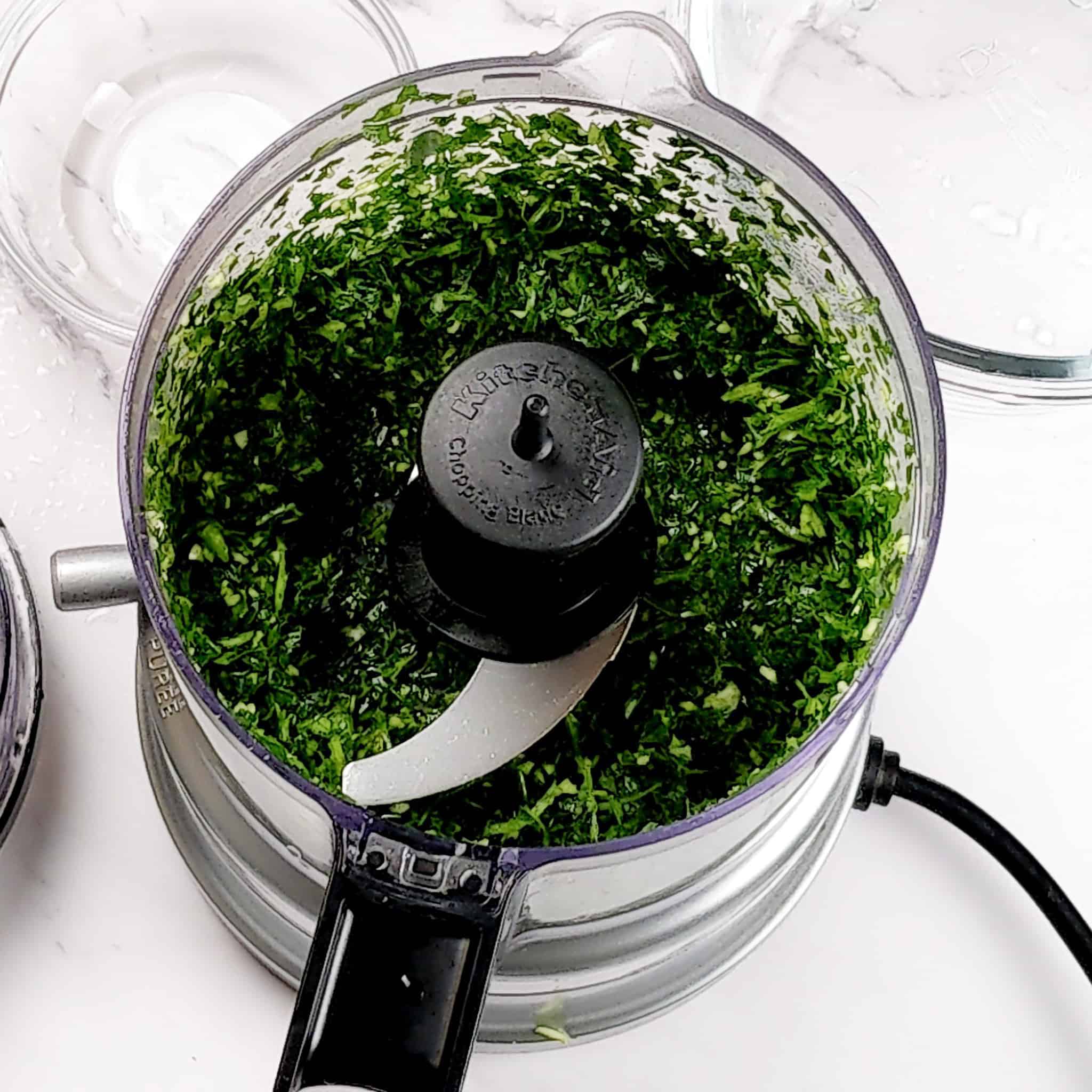 chopped parsley, garlic and shallots in a kitchenaid food processor.