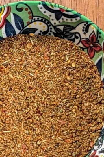spicy all purpose seasoning blend in a decorative bowl.
