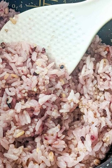 up close view of the multigrain rice in the rice cooker.