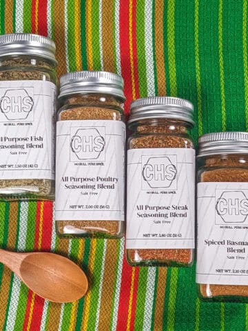 The meal prep bundle from custom herb spice shop, displaying four custom gourmet spice blends: All Purpose Fish Seasoning, All Purpose Poultry Seasoning, All Purpose Steak Seasoning, and Spiced Basmati Rice Blend.