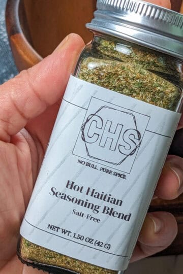 hot haitian spice blend held in hand.