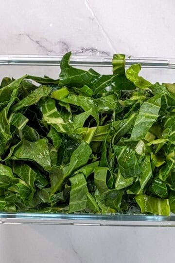 collard greens in a glass container.