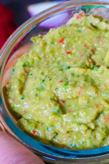 guacamole in a glass bowl.