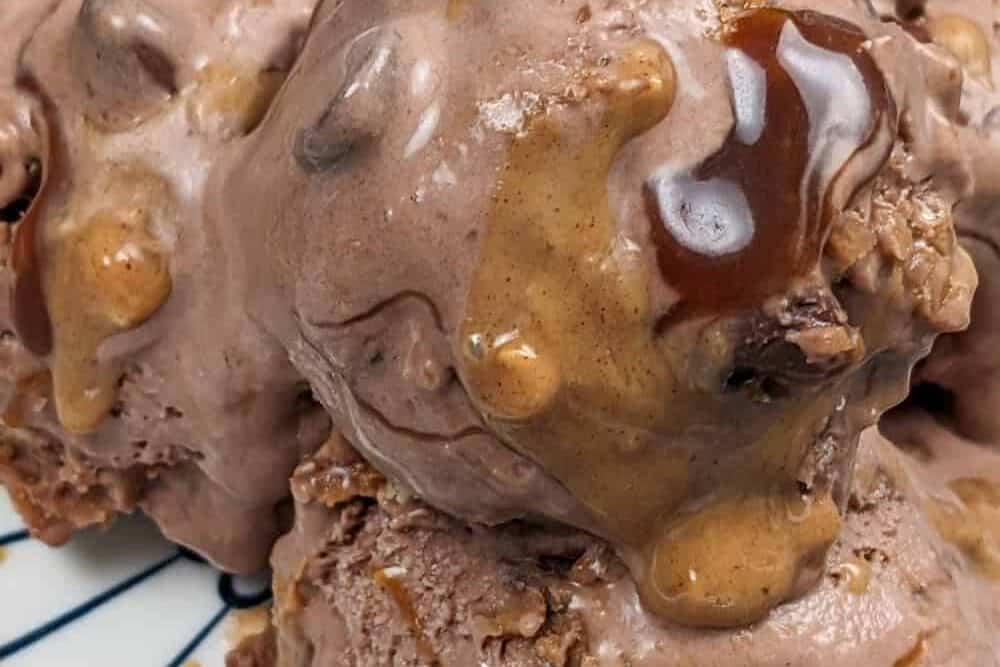 candy bar ice cream scoops in a bowl.