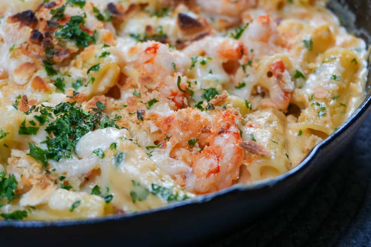 haitian style white mac and cheese with red shrimp.