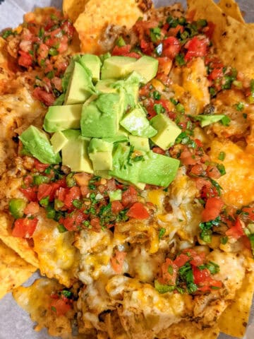 top view of air fryer chicken nachos.
