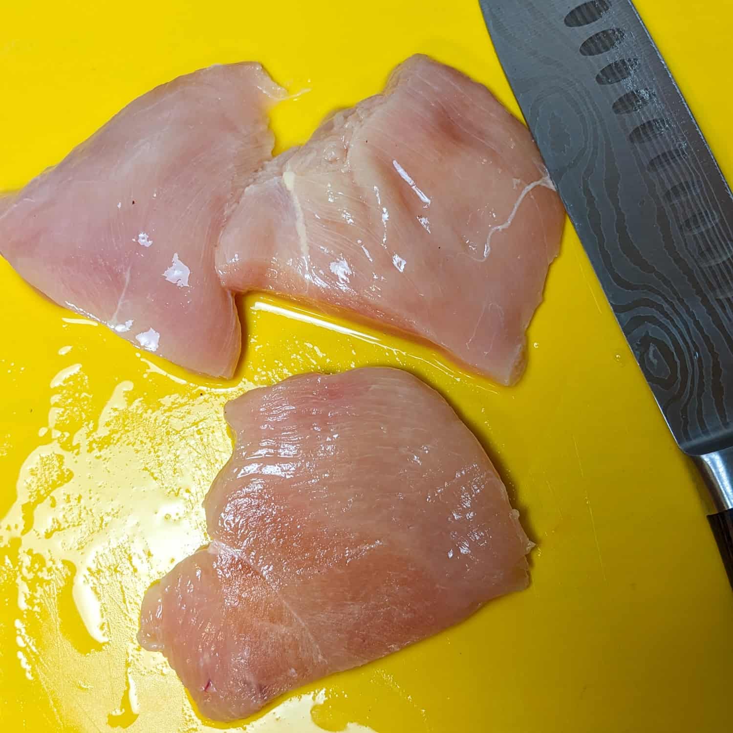 chicken breast cut into quarters.