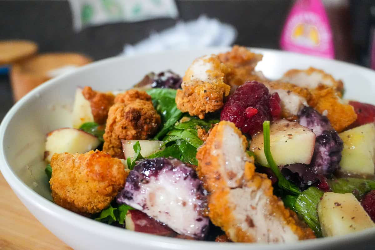 side close up of the Fresh Berry Apple Pecan Chicken Salad with Goat Cheese.