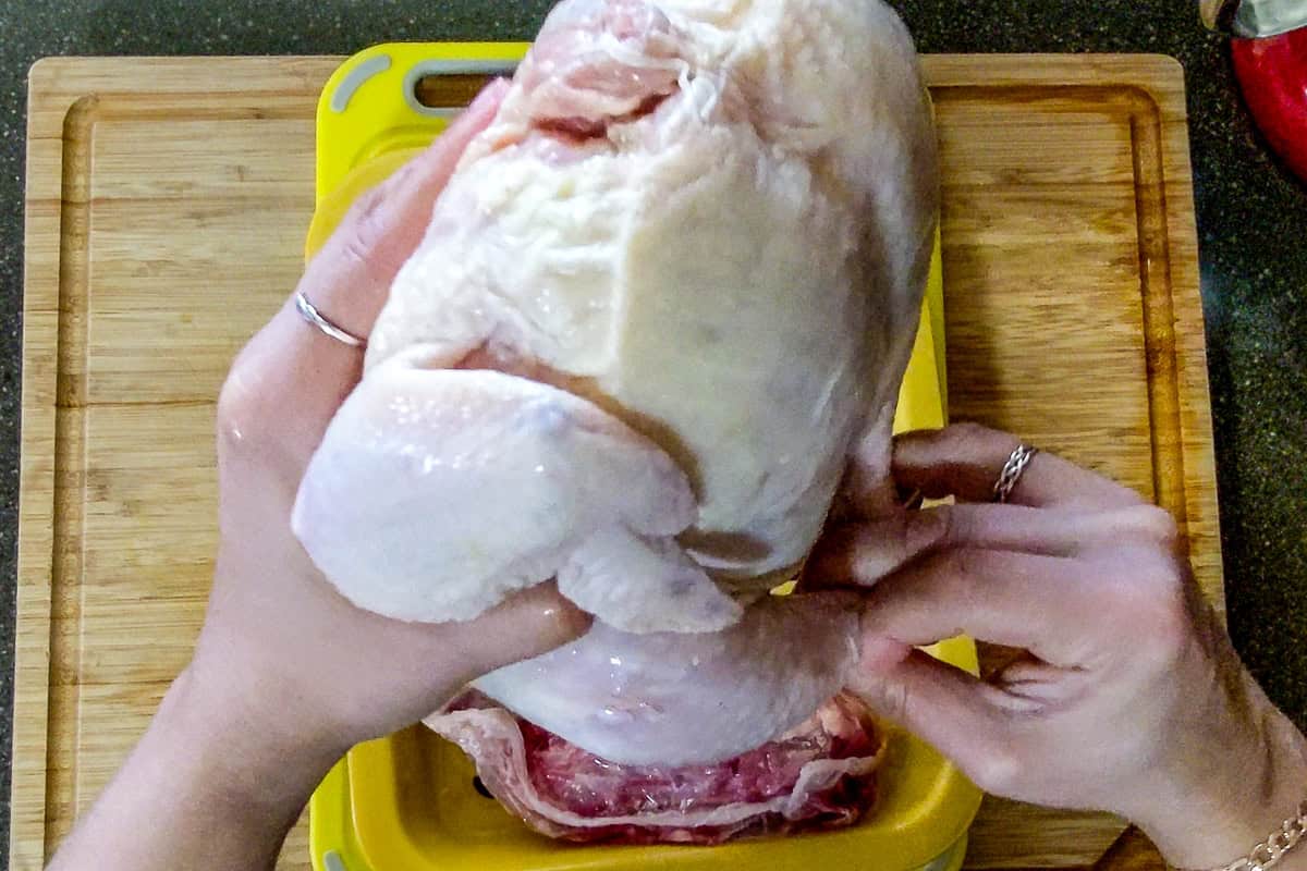 draining more of the excess liquid out of the whole chicken.