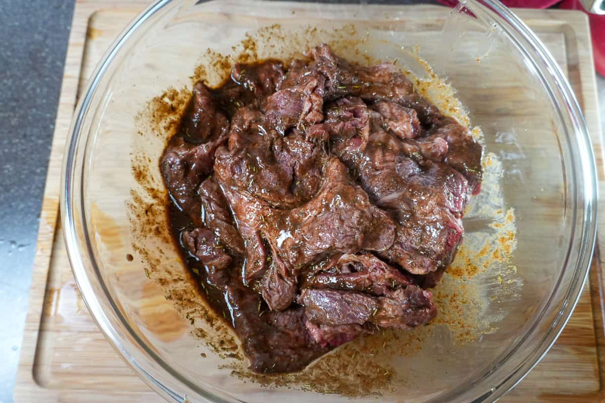 steak marinating in the marinade.