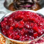 close up of the cranberry ginger chutney in a small decorative pan.
