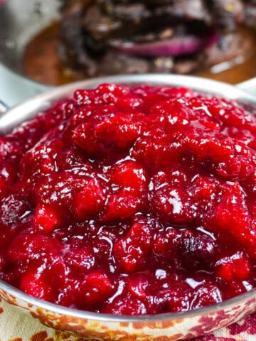 close up of the cranberry ginger chutney in a small decorative pan.