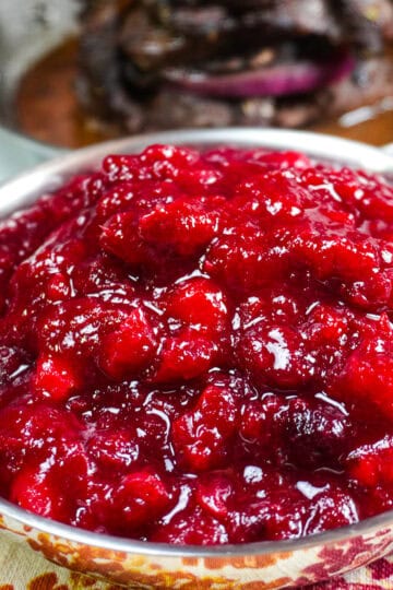 close up of the cranberry ginger chutney in a small decorative pan.