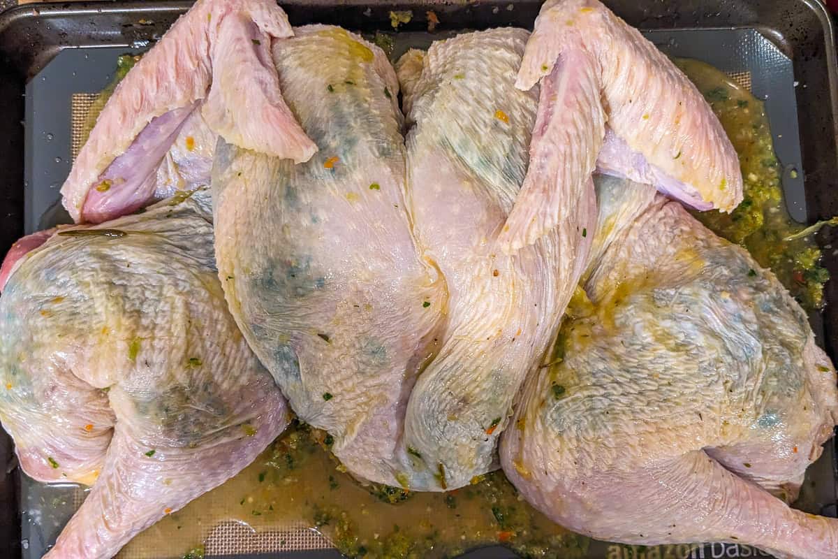 under the skin seasoned spatchcock turkey.