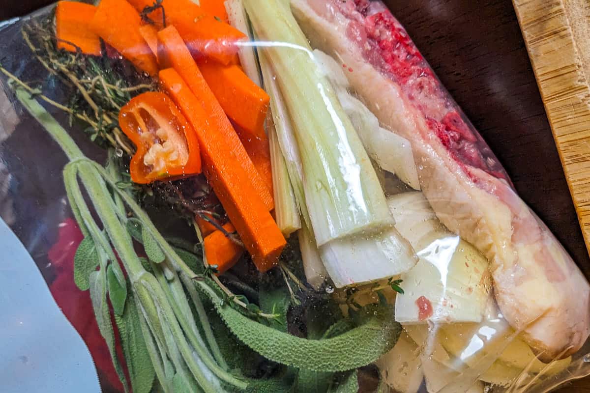 Mirepoix-Based Turkey Gravy with Haitian Spices in a resealable bag.