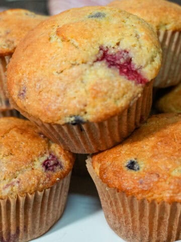 place of stacked Banana Berry Corn Muffins with Yogurt.