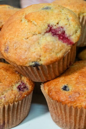 place of stacked Banana Berry Corn Muffins with Yogurt.