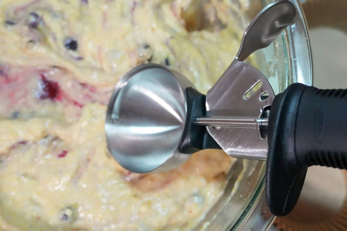 Oxo portion scoop on top of the mixed batter.