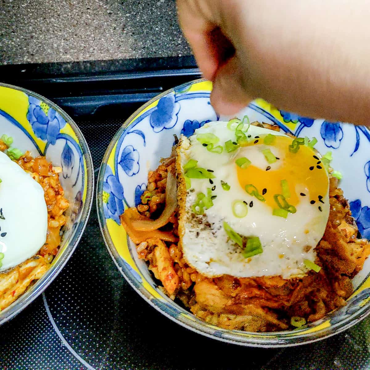 seasame and chopped scallinos sprinkled on kitchen rice.