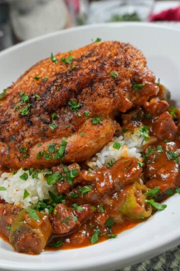 close up plate up of the Pan-Roasted Chicken and Andouille Sausage Gumbo in a wide rim bowl.