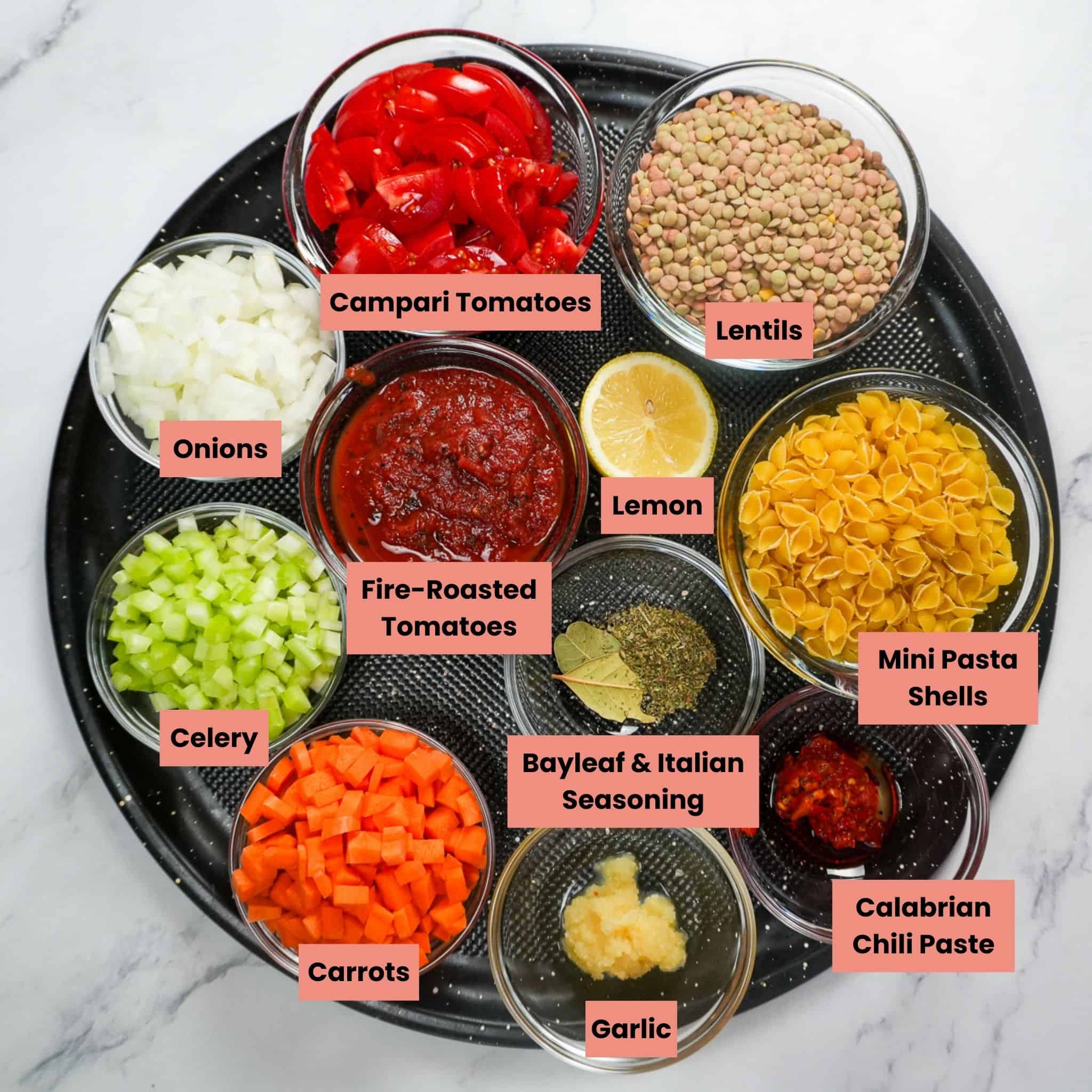 ingredients on a tray in containers for the Pasta and Lentil Soup Recipe.