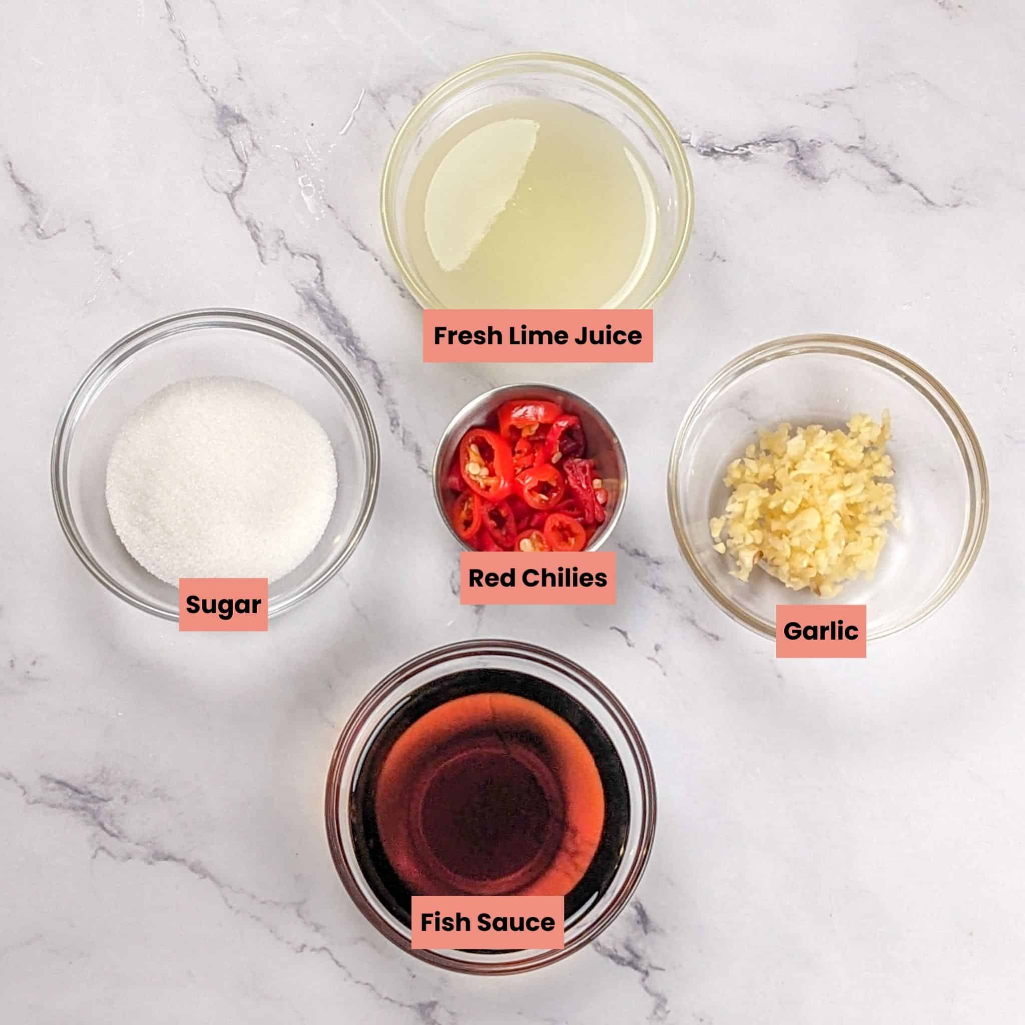 ingredients in containers for the Nuoc Cham Sauce.