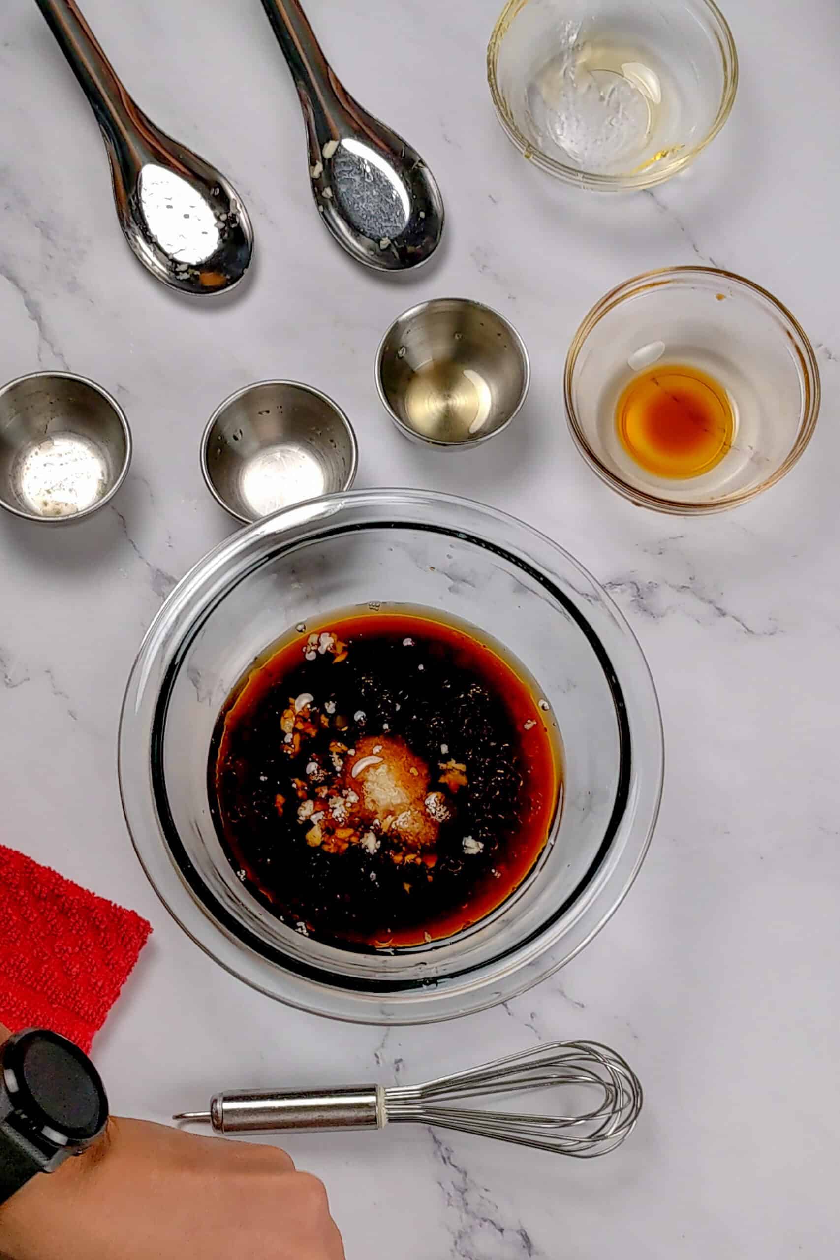all the ingredients for the dressing in a bowl.