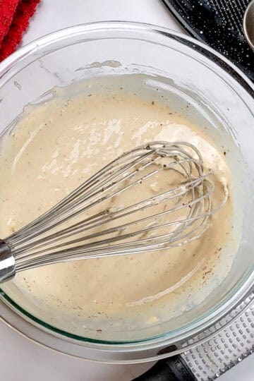 close up of the homemade caesar dressing.