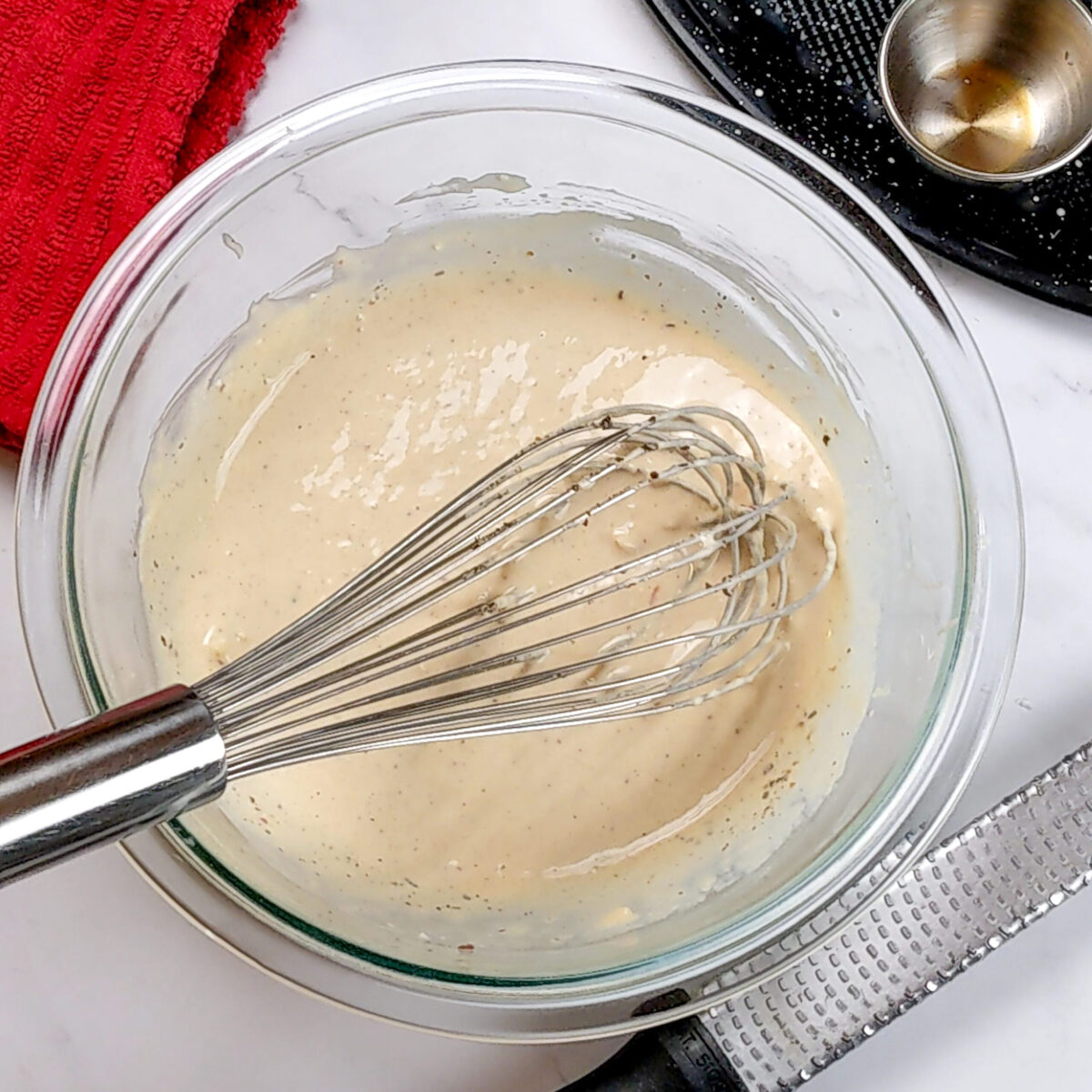 close up of the homemade caesar dressing.