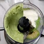 a split before and after image of the Avocado Cream Sauce in the kitchenaid food chopper.