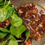 Date Pecan Pomegranate Vinaigrette upclose on a split image with it also dressed in spinach.